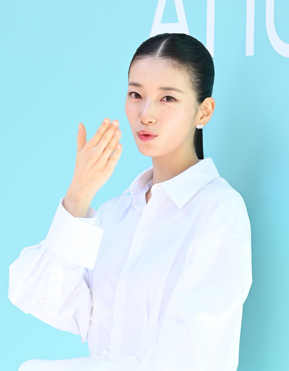 Suzy Steps Out in White at Anua PDRN Popup Before Two Major Drama Roles