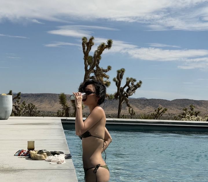 Hwasa shows off her fit body and relatable moments in new vacation photos