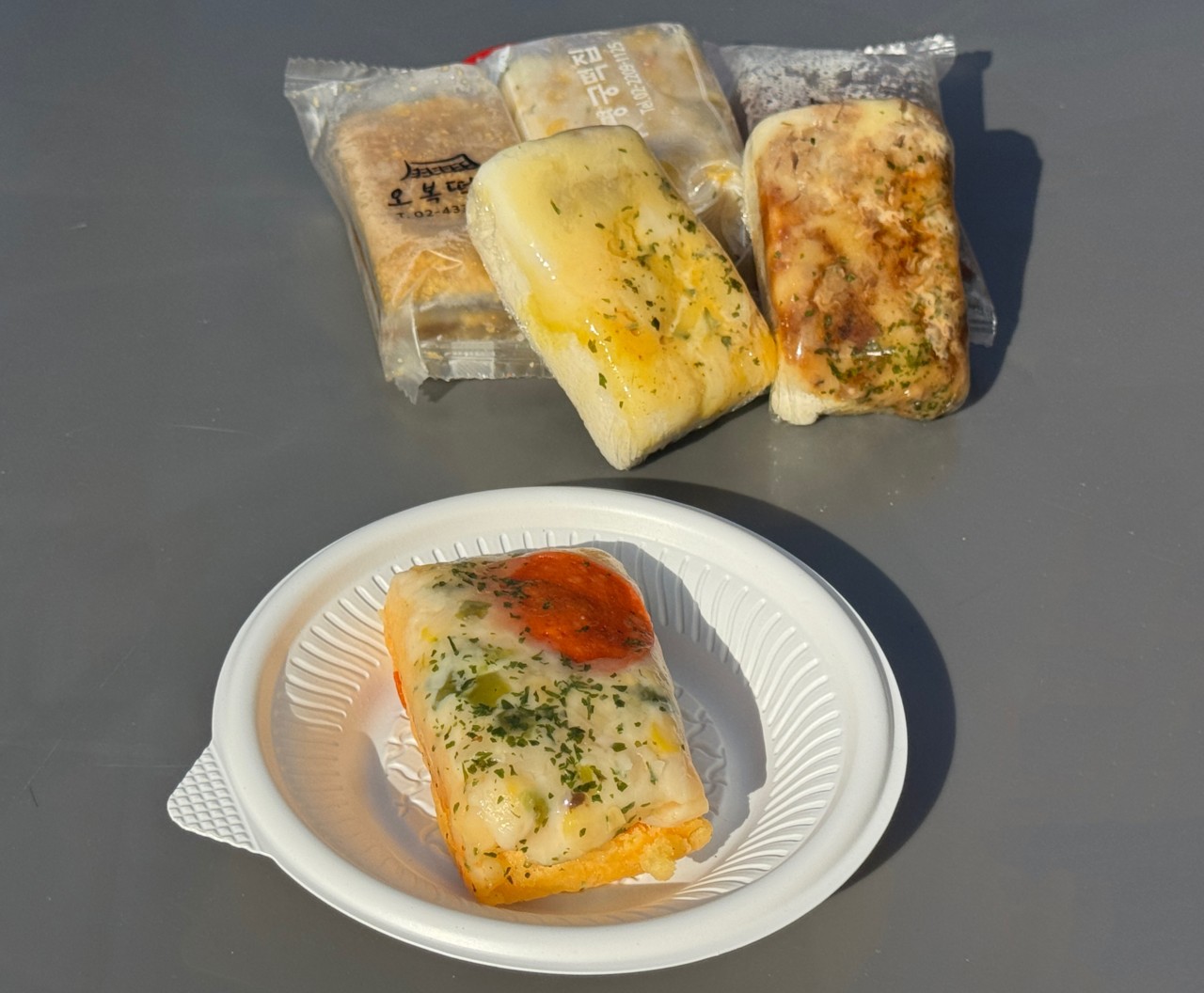 Lines Form Before 8:30 a.m. for Seoul's Pizza Rice Cake. Here's What's Driving It